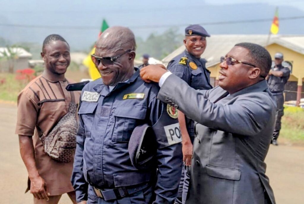 SDO Affixing Epaulet on Promoted Officer, Sube Gabriel Kome