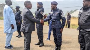 SDO Mungambo Greets Police Officers at Ceremony