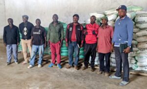 Nzuobontane, Right, with some farmers at BAFCOOP office