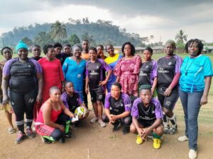 Dr. Munge Encourages Female Football Team in Tombel