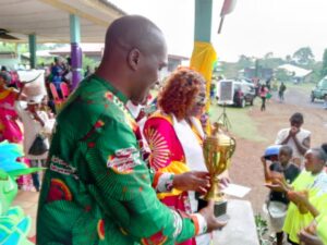 DO and Dr. Ngome Hands Trophy to Football Champions