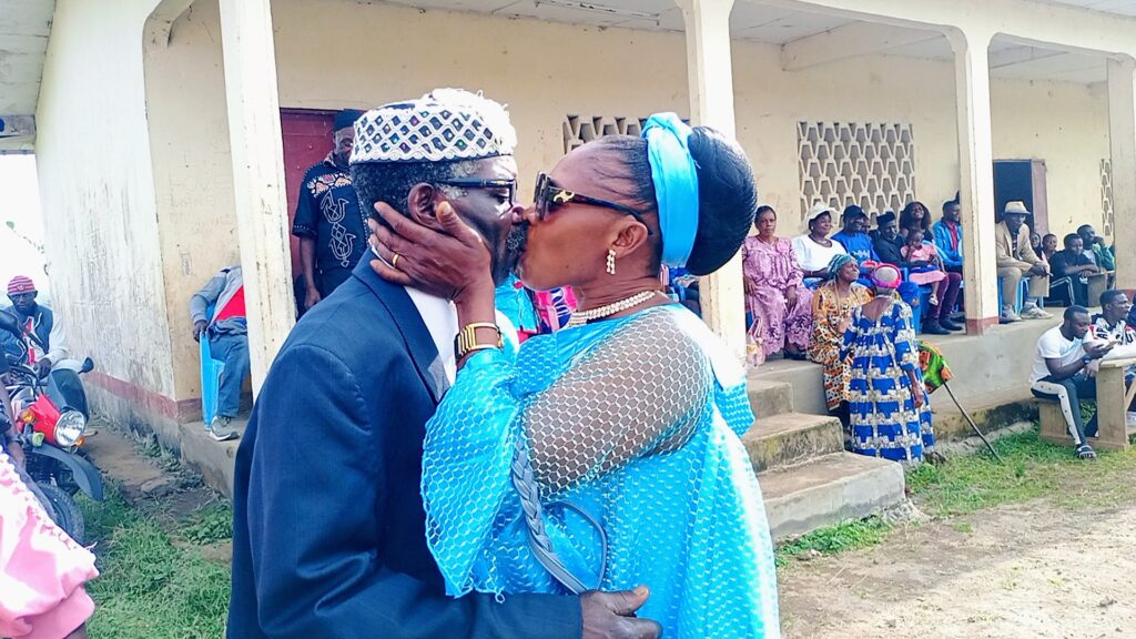 The Wedding Kiss by Couple