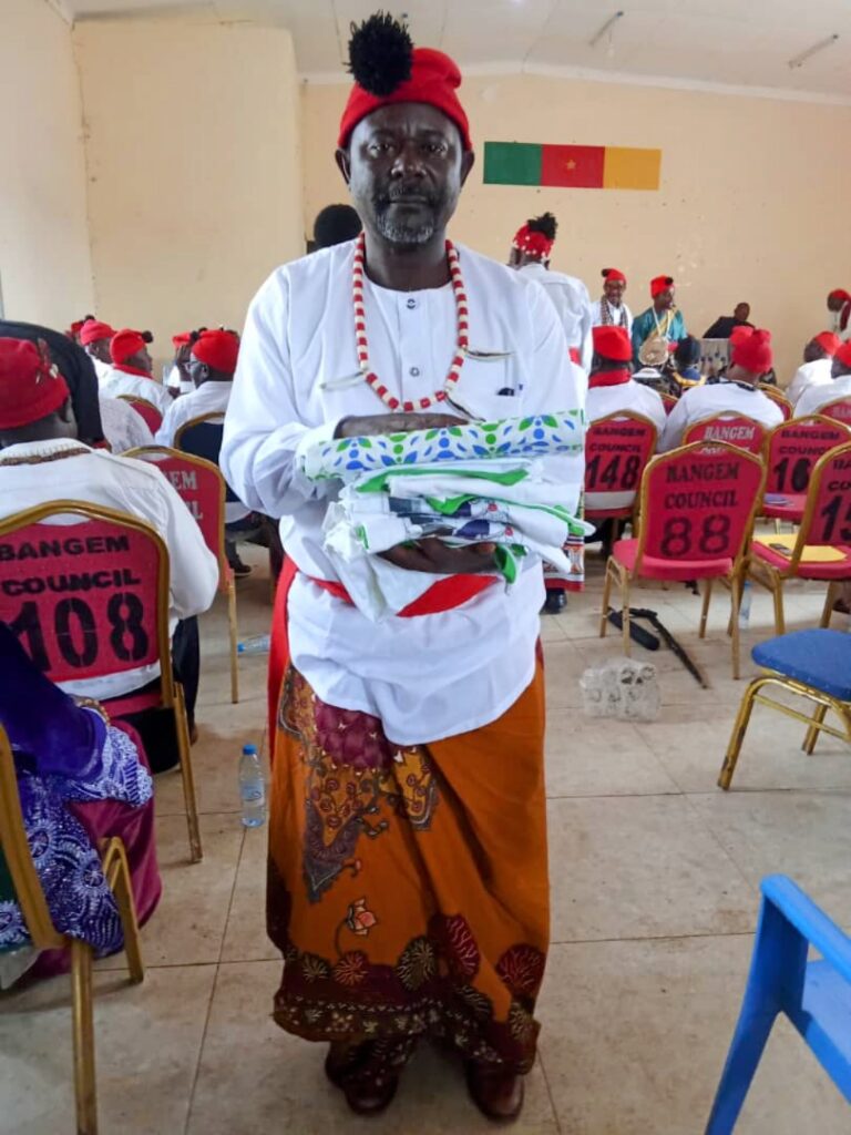 Chief Abwe Boniface of Kodmin Village with Gadgets