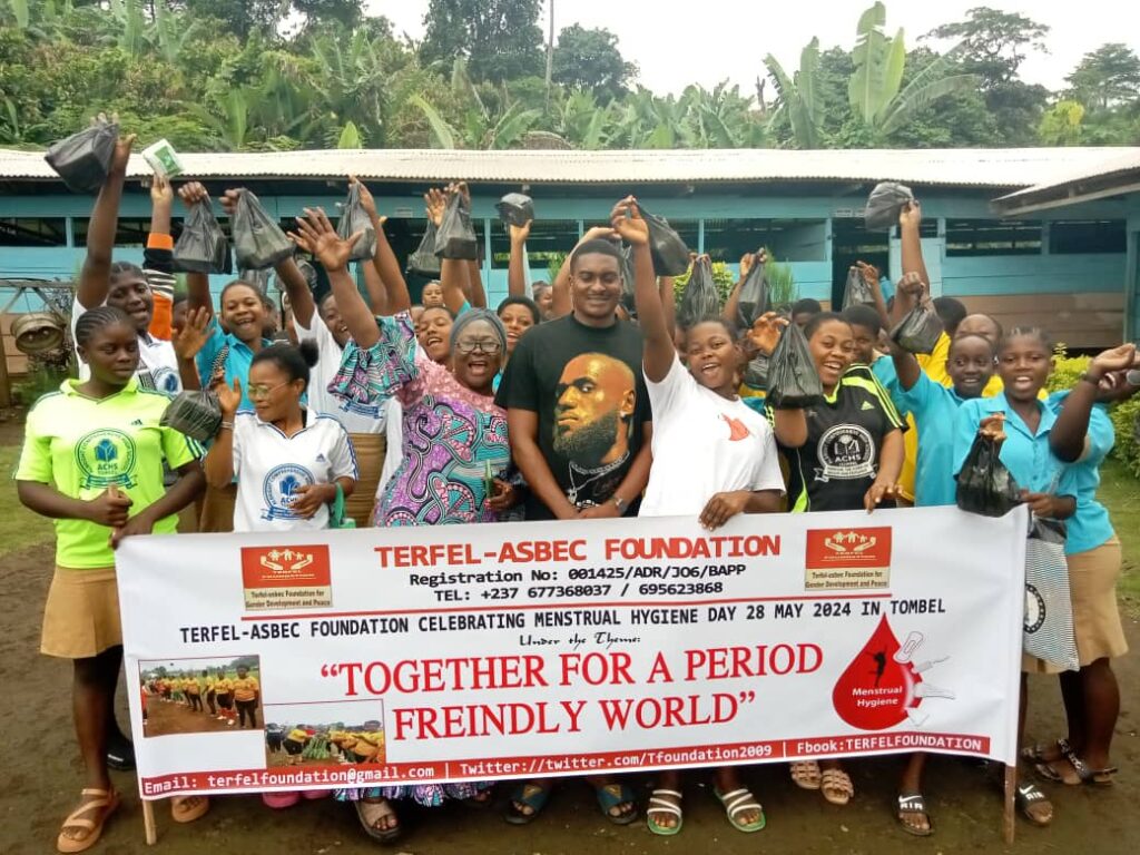 TAFGEDEP Donates Menstrual Kits, Sensitizes Students in Tombel TAFGEDEP Team Celebrating with Students