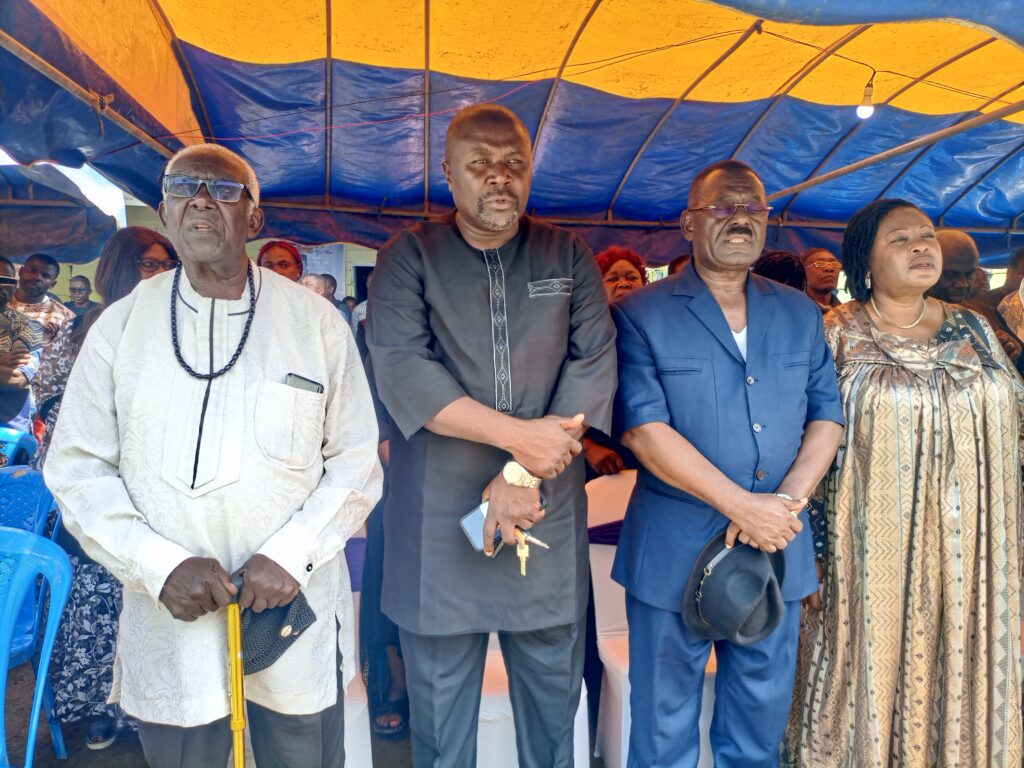 Officials Praying at Funeral Service