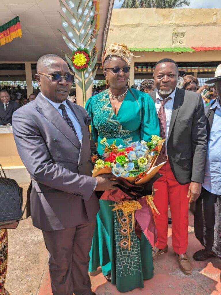 HRM Chief Mbong Walter Receives Bouquet of Flower from Wife