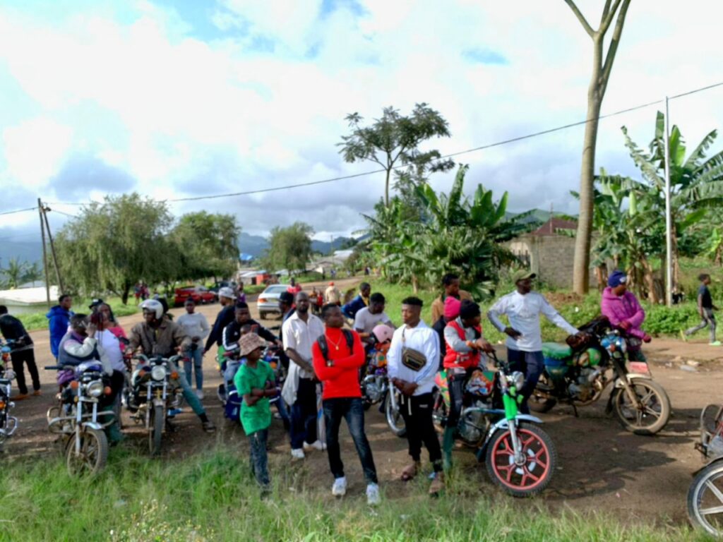 Bike Riders Watching Football Competition