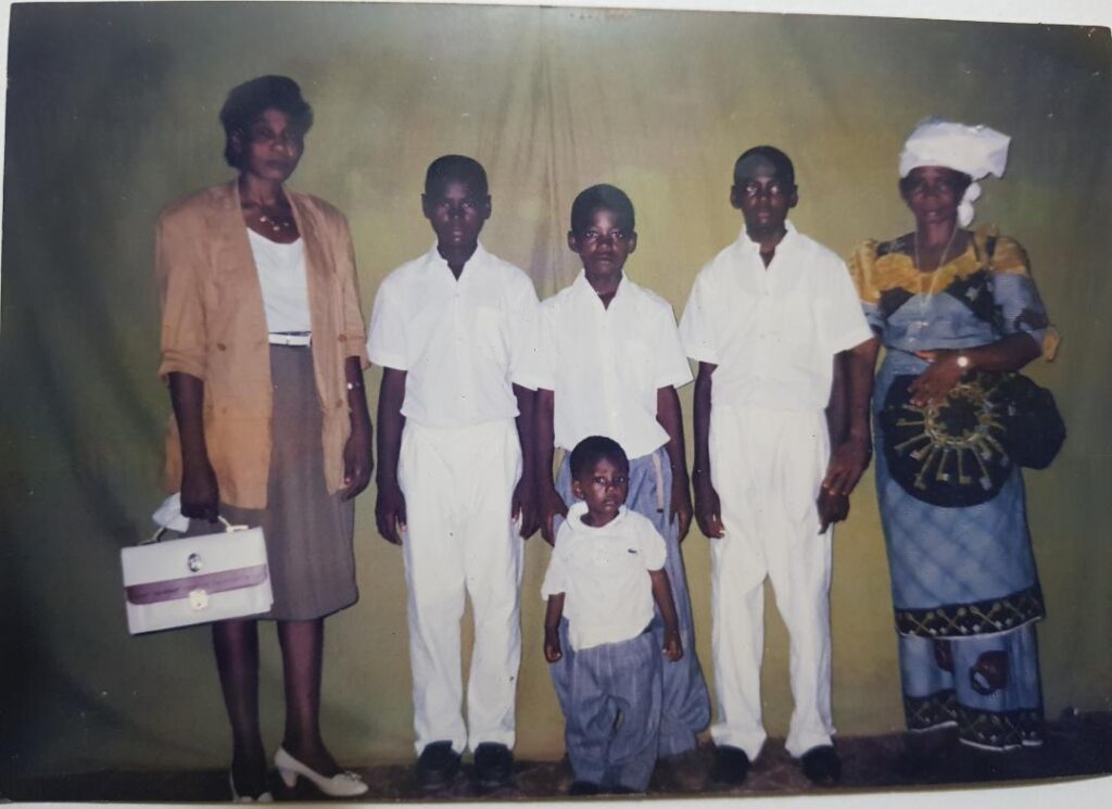 Munge Enongene Florence, Left, with Sons and Sister